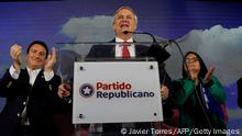 Former Chilean Presidential Candidate and founder of the far-right Republican Party, Jose Antonio Kast (C), talks to the press about the victory of his candidates during an election to choose members of a Constitutional Council who will draft a new constitution proposal, at the Republican Party headquarters in Santiago on May 7, 2023. - Chileans voted on Sunday to elect the 50 members of a committee that will write a new constitution to replace the dictatorship-era one that has been in vigor for more than 40 years. (Photo by JAVIER TORRES / AFP) (Photo by JAVIER TORRES/AFP via Getty Images)