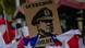 "Queremos orden", se lee en una pancarta con el retrao de Augusto Pinochet. "Queremos orden", se lee en una pancarta con el retrao de Augusto Pinochet.