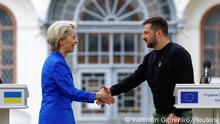 European Commission President Ursula von der Leyen and Ukraine's President Volodymyr Zelenskiy shake hands after a joint press conference, amid Russia's attack on Ukraine, in Kyiv, Ukraine May 9, 2023. REUTERS/Valentyn Ogirenko