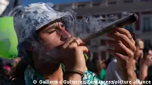 May 6, 2023, Madrid, Spain: A man is seen smoking a large joint during the Global Marijuana March. Hundreds of pro-cannabis activists demonstrate in Puerto del Sol, Madrid city center, to demand a law to legalize cannabis with a medicinal and recreational use. (Credit Image: © Guillermo Gutierrez/SOPA Images via ZUMA Press Wire