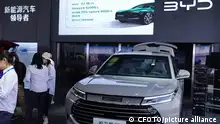YICHANG, CHINA - MAY 12, 2023 - Citizens look at BYD vehicles displayed at the 2023 Yichang Auto Exhibition in Yichang, Hubei province, China, May 12, 2023. According to the China Association of Automobile Manufacturers, from January to April 2023, China's auto production and sales volume reached 8.355 million and 8.235 million, respectively, up 8.6% and 7.1% year on year.
