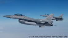 21/03/2023 **FILE PHOTO: F-16 aircrafts fly during a NATO media event at an airbase in Malbork, Poland, March 21, 2023. REUTERS/Lukasz Glowala/File Photo