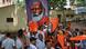 A group of BJP supporters hold up a large portrait of Modi ahead of the Karnataka vote A group of BJP supporters hold up a large portrait of Modi ahead of the Karnataka vote