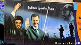 Plakat des syrischen Präsidenten Baschar Al Assad und des Hisbollah-Führers Hassan Nasrallah in Damaskus (Foto: DPA)