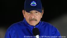 FILE - In this March 21, 2019 file photo, Nicaragua's President Daniel Ortega speaks during the inauguration ceremony of a highway overpass in Managua, Nicaragua. The Central American nation's National Assembly approved a controversial law Thursday, Oct. 15, 2020, that would give the government of President Ortega more power to monitor people, businesses and organizations that receive funding from overseas. (AP Photo/Alfredo Zuniga, File)