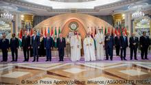 In this photo provided by the Saudi Press Agency, SPA, leaders of Arab countries pose for a group picture ahead of the Arab summit in Jeddah, Saudi Arabia, Friday, May 19, 2023. (Saudi Press Agency via AP)