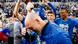 Players pour beer on the head of Darmstadt coach Torsten Lieberknecht as they celebrate promotion on the pitch with fans after a 1-0 win against FC Magdeburg. May 19, 2023. Players pour beer on the head of Darmstadt coach Torsten Lieberknecht as they celebrate promotion on the pitch with fans after a 1-0 win against FC Magdeburg. May 19, 2023.