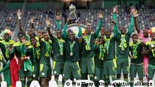 (230520) -- ALGIERS, May 20, 2023 (Xinhua) -- Senegal's players celebrate with the trophy during the awarding ceremony of the U17 Africa Cup of Nations at Nelson Mandela Stadium in Algiers, Algeria, May 20, 2023. (Xinhua)