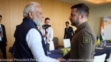 Ukraine's President Volodymyr Zelensky (R) meets with India's Prime Minister Narendra Modi (L), during the G7 Leaders' Summit on Saturday May 20, 2023 in Hiroshima, Japan. Japan hosts The G7 summit in Hiroshima from 19-22 May. Photo by Ukrainian President Press Office/ UPI Photo via Newscom picture alliance