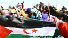 20/05/2023**Saharaui refugees celebrate the 50th anniversary of the Polisario Front in the Aoussered camp, Algeria, Saturday, May 20, 2023. The pro-independence Polisario Front, representing the local Sahrawi population and backed by Algeria, fought Moroccan forces for years for control of the Watern Sahara. (AP Photo/Guidoum Fateh)