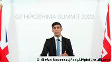 British Prime Minister Rishi Sunak speaks at a press conference at the International Conference Centre during the G7 Summit in Hiroshima, western Japan, Sunday May 21, 2023. (Stefan Rousseau/Pool Photo via AP)