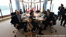 May 21, 2023, Hiroshima, Hiroshima Prefecture, Japan: Leaders of the G7 group of nations hold a session with Ukrainian President Volodymyr Zelenskyy, rear center, at the G7 Leaders Summit at the Grand Prince Hotel, May 21, 2023 in Hiroshima, Japan. Sitting from left: U.S. President Joe Biden, German Chancellor Olaf Schotz, U.S. President Joe Biden, British Prime Minister Rishi Sunak, European Commission President Ursula von der Leyen, Ukrainian President Volodymyr Zelenskyy, European Council President Charles Michel, Italian ambassador to Japan Gianluigi Benedetti, Canadian Prime Minister Justin Trudeau, French President Emmanuel Macron, and Japanese Prime Minister Fumio Kishida. Hiroshima Japan - ZUMAp138 20230521_zaa_p138_079 Copyright: xPoolx/G7xHiroshimax