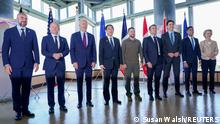 President Joe Biden, and Ukrainian President Volodymyr Zelenskiy, and other G7 leaders pose for a photo before a working session on Ukraine during the G7 Summit in Hiroshima, Japan, Sunday, May 21, 2023. Susan Walsh/Pool via REUTERS