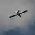 Дрон самолетного типа в небе (фото из архива)