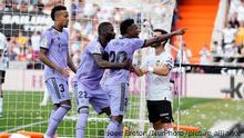 Vinicius Junior left winger of Real Madrid and Brazil accuses a fan of making racist insults during the LaLiga Santander match between Valencia CF and Real Madrid CF at Estadio Mestalla on May 21, 2023 in Valencia, Spain. (Photo by Jose Breton/Pics Action/NurPhoto)