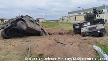 ***ACHTUNG: Dieses Bild wurde vom Russischen Verteidigungsministerium herausgegeben!***ATTENTION: This image was issued by the Russian Ministry of Defense!***
DIESES FOTO WIRD VON DER RUSSISCHEN STAATSAGENTUR TASS ZUR VERFÜGUNG GESTELLT. [RUSSIA, BELGOROD REGION - MAY 23, 2023: Burned armored vehicles of a Ukrainian sabotage and reconnaissance group. According to Russian Defence Ministry Spokesman Igor Konashenkov, on May 23, 2023, more than 70 Ukrainian terrorists have been eliminated during a counter-terrorism operation. According to Belgorod Region authorities, the terrorists actions have left one civilian casualty and 13 injuries. Video grab. Best quality available. Russian Defence Ministry/TASS]