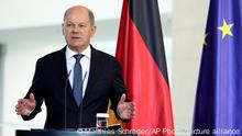 Germany's Chancellor Olaf Scholz speaks during a media conference at the chancellery in Berlin, Germany, Sunday, May 14, 2023. Ukrainian President Volodymyr Zelenskyy arrived in Berlin early Sunday for talks with German leaders about further arms deliveries to help his country fend off the Russian invasion and rebuild what's been destroyed by more than a year of devastating conflict. (AP Photo/Matthias Schrader)