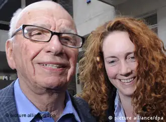 epa02828323 (FILES) A file photo dated 10 July 2011 showing Rebekah Brooks, then chief executive of News International (R) walking into a hotel with Rupert Murdoch (L) Chairman of News Corporation in London . According to news reports on 17 July 2011, Brooks has been arrested by Metropolitan Police as part of phone hack investigation. EPA/FACUNDO ARRIZABALAGA