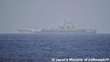 6.4.2023**
This handout photo taken on April 5, 2023 and released on April 6, 2023 by Japan's Ministry of Defense shows the Chinese aircraft carrier Shandong in Pacific Ocean waters, some 300 kms (186 miles) south of Okinawa prefecture. Taiwan's defence ministry said on April 6 that a Chinese anti-submarine helicopter and three warships had been detected around the self-ruled island, after President Tsai Ing-wen met US House Speaker Kevin McCarthy in Los Angeles. (Photo by Handout / Japan's Ministry of Defense / AFP) / -----EDITORS NOTE --- RESTRICTED TO EDITORIAL USE - MANDATORY CREDIT AFP PHOTO / Japan's Ministry of Defense - NO MARKETING - NO ADVERTISING CAMPAIGNS - DISTRIBUTED AS A SERVICE TO CLIENTS