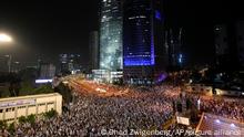 Israelis protest plans by Prime Minister Benjamin Netanyahu's far-right government to overhaul the judicial system, in Tel Aviv, Israel, Saturday, May 27, 2023. (AP Photo/ Ohad Zwigenberg)