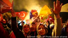 Supporters of Turkish President Recep Tayyip Erdogan celebrate in Istanbul, Turkey, Sunday, May 28, 2023. Turkey's incumbent President Recep Tayyip Erdogan has declared victory in his country's runoff election, extending his rule into a third decade. (AP Photo/Emrah Gurel)