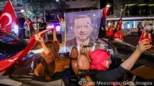 BERLIN, GERMANY - MAY 28: Local Turks celebrate along the Kurfürstendamm avenue, the preliminary results in Turkey's general election run-off that indicate a win for Recep Tayyip Erdogan on May 28, 2023 in Berlin, Germany. Germany is home to Turkey's largest diaspora, a high percentage of whom turned out to vote in elections pitting Turkish President Recep Tayyip Erdogan against economist and opposition challenger Kemal Kilicdaroglu. (Photo by Omer Messinger/Getty Images)