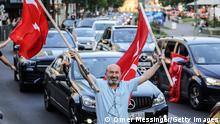 BERLIN, GERMANY - MAY 28: Local Turkish people celebrate along the Kurfürstendamm avenue, the preliminary results in Turkey's general election run-off that indicate a win for Recep Tayyip Erdogan on May 28, 2023 in Berlin, Germany. Germany is home to Turkey's largest diaspora, a high percentage of whom turned out to vote in elections pitting Turkish President Recep Tayyip Erdogan against economist and opposition challenger Kemal Kilicdaroglu. (Photo by Omer Messinger/Getty Images)