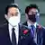 Japanese Prime Minister Fumio Kishida (L) and his son Shotaro arrive at the prime minister's office in Tokyo in October 2022