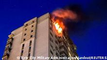 An apartment building burns after being damaged during a massive Russian drone strike, amid Russia's attack on Ukraine, in Kyiv, Ukraine May 30, 2023. Press service of the Kyiv City Military Administration/Handout via REUTERS ATTENTION EDITORS - THIS IMAGE HAS BEEN SUPPLIED BY A THIRD PARTY. NO RESALES. NO ARCHIVES. TPX IMAGES OF THE DAY 