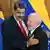 Venezuela's President Nicolas Maduro and Brazil's President Luiz Inacio Lula da Silva hugging each other