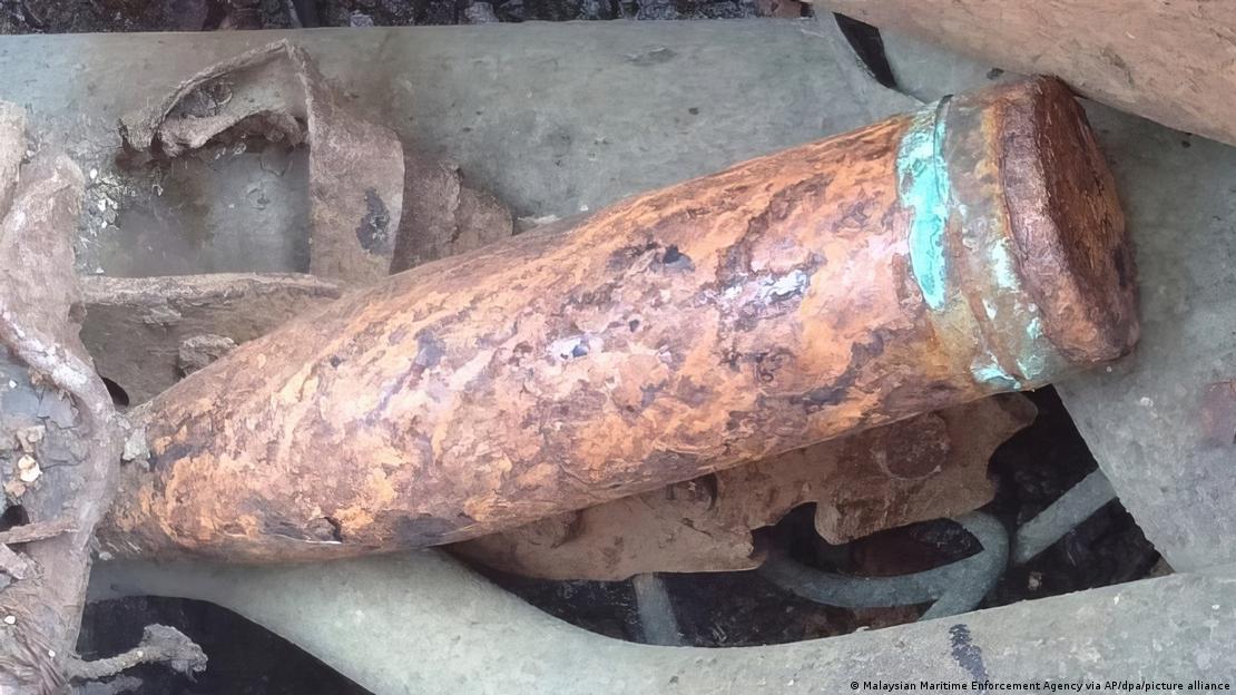 A rusted shell and scrap metal