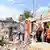 Іноземні волонтери на завалах зруйнованого будинку в Горенці