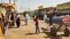 A donkey drawn cart moves along stalls of the Khartoum market A donkey drawn cart moves along stalls of the Khartoum market