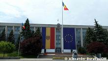 Government HQ in Chisinau, Moldova, with large banners of Moldova and the EU
