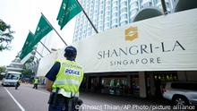 Shangri-La hotel in Singapore with policemen in front