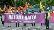 The Alliance against NATO network take part in a demonstration in support of democratic forces in Turkey and against Swedish NATO membership, in Stockholm, Sunday June 4, 2023. Hundreds of people, including dozens of pro-Kurdish protesters, gathered in Stockholm to demonstrate against Sweden’s planned NATO membership. They rallied under the banner of the “Alliance Against NATO,” an umbrella for a mix of Kurdish organizations, leftist groups, anarchists, youth and climate activists and people opposed to Sweden’s new anti-terror laws, which took effect on June 1, as well as those calling for free media. (Maja Suslin/TT News Agency via AP)