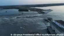 06.06.2023+++ In this image taken from video released by the Ukrainian Presidential Office, water runs through a breakthrough in the Kakhovka dam in Kakhovka, Ukraine, Tuesday, June 6, 2023. Ukraine on Tuesday accused Russian forces of blowing up the major dam and hydroelectric power station in a part of southern Ukraine they control, threatening a massive flood that could displace hundreds of thousands of people, and ordered residents downriver to evacuate. (Ukrainian Presidential Office via AP)