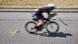 Beim Ironman Hamburg passiert ein Triathlet mit dem Rennrad die auf dem Asphalt markierte Stelle, an der zuvor ein Motorradfahrer ums Leben kam. Beim Ironman Hamburg passiert ein Triathlet mit dem Rennrad die auf dem Asphalt markierte Stelle, an der zuvor ein Motorradfahrer ums Leben kam.