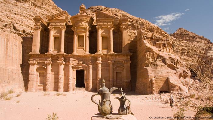 Jordan |  Bedouin tea carafes in front of Ed-Deir, The Monastery, Petra