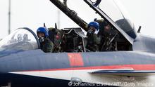 11/11/2014 **A female pilot sits in a J-10 fighter jet of the Bayi Aerobatic Team of PLA's (Peoples Liberation Army) Air Force before taking off at the Airshow China 2014 in Zhuhai, south China's Guangdong province on November 11, 2014. Global aviation firms flocked to China on November 11 to show off their wares as economic development and an expanding middle class promise a bonanza in one of the world's fastest-growing aircraft markets. The 10th Airshow China 2014 takes place from November 11 to 16. AFP PHOTO / JOHANNES EISELE (Photo credit should read JOHANNES EISELE/AFP via Getty Images)