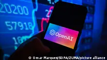 March 21, 2023, Poland: In this photo illustration, an Open AI logo is displayed on a smartphone with stock market percentages in the background. (Credit Image: © Omar Marques/SOPA Images via ZUMA Press Wire
