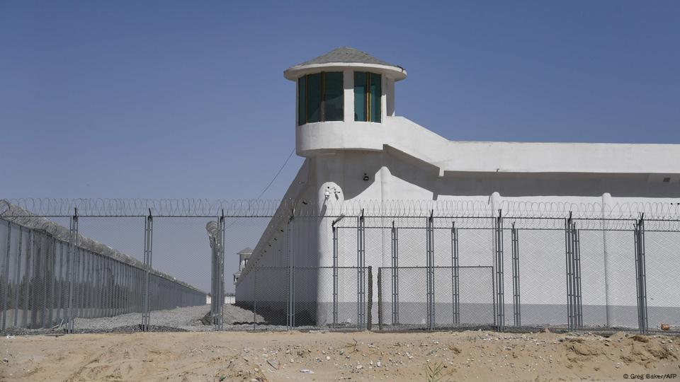 This file photo taken on May 31, 2019 shows a watchtower on a high-security facility near what is believed to be a re-education camp where mostly Muslim ethnic minorities are detained, on the outskirts of Hotan, in China's northwestern Xinjiang region This file photo taken on May 31, 2019 shows a watchtower on a high-security facility near what is believed to be a re-education camp where mostly Muslim ethnic minorities are detained, on the outskirts of Hotan, in China's northwestern Xinjiang region