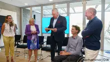 Prof. Manuela Rousseau passes the baton to DW Director General Peter Limbourg.