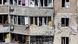 People stay on the balconies of an apartment building affected by the overnight attack of Russian troops that involved missiles People stay on the balconies of an apartment building affected by the overnight attack of Russian troops that involved missiles