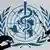 A syringe and vaccine dose in front of the WHO logo