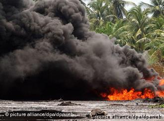 A burning oil pipeline in the Niger Delta A burning oil pipeline in the Niger Delta