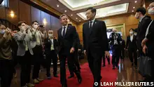 U.S. Secretary of State Antony Blinken walks with China's Foreign Minister Qin Gang at the Diaoyutai State Guesthouse in Beijing, China, June 18, 2023. REUTERS/Leah Millis/Pool