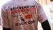 A person wearing a campaign shirt in favor of constitutional changes A person wearing a campaign shirt in favor of constitutional changes