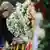 Merkel homenageou vítimas do Muro com coroa de flores
