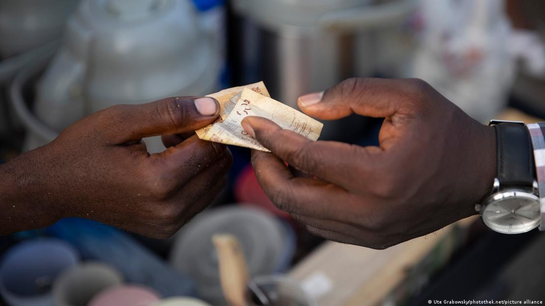 Transaction financière entre deux personnes.